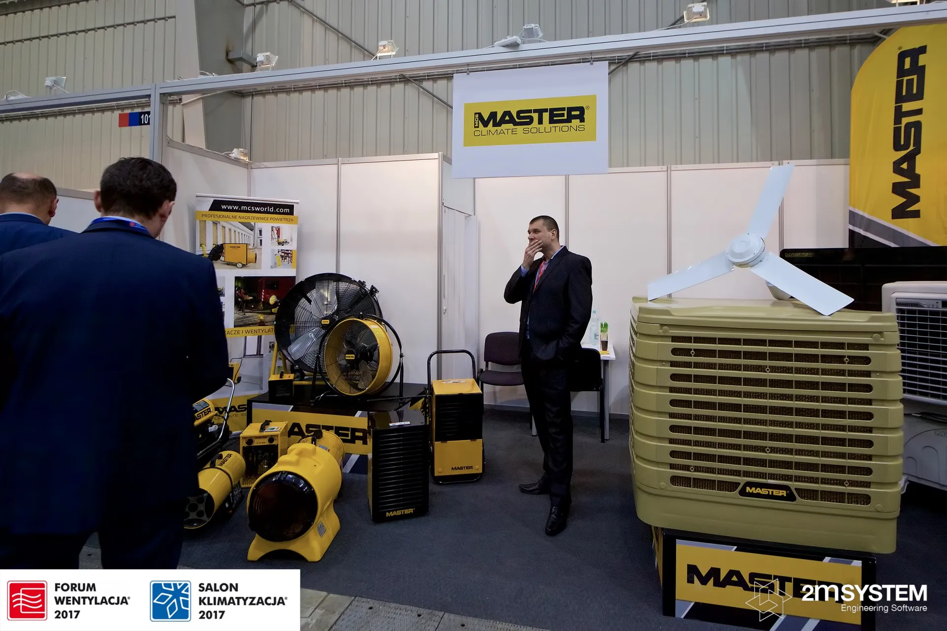 Master evaporative cooler with fan rotor beside portable heaters at Forum Wentylacja 2017