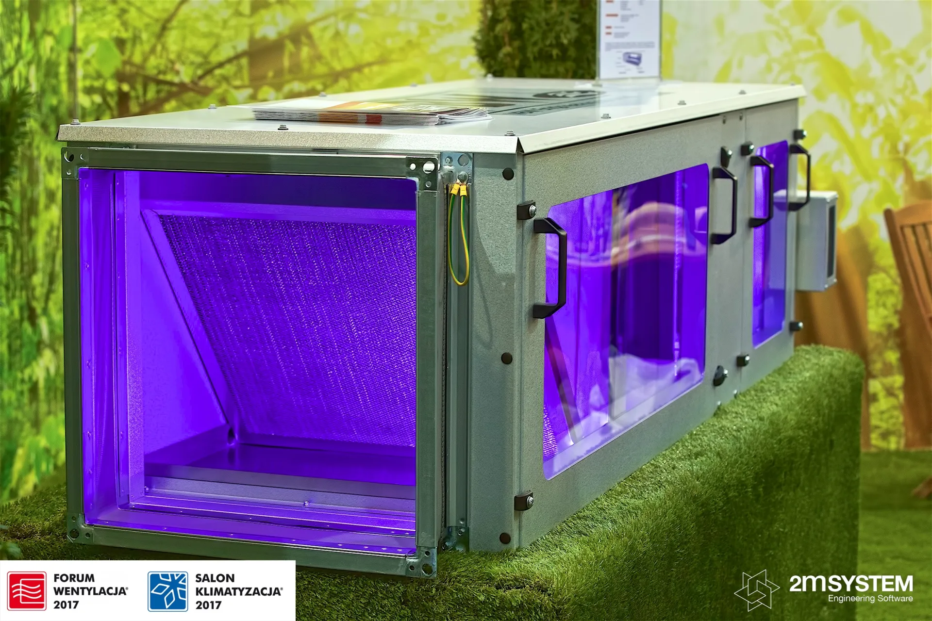 Open filter section of a ventilation unit lit in violet light at Forum Wentylacja 2017