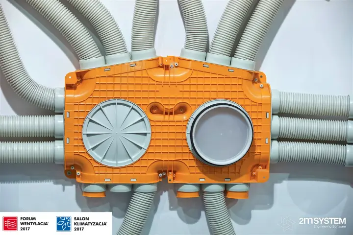 Orange R-VENT plenum box with grey flexible ducts at Forum Wentylacja 2017