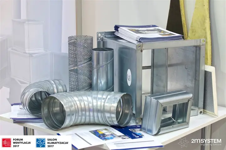 Spiral duct, perforated tube and rectangular duct samples on a table