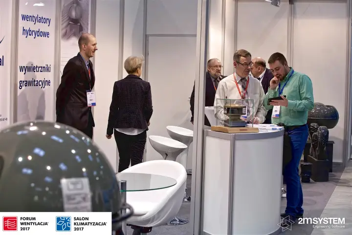 Uniwersal stand with gravity vent panel and white lounge seating at Forum Wentylacja 2017