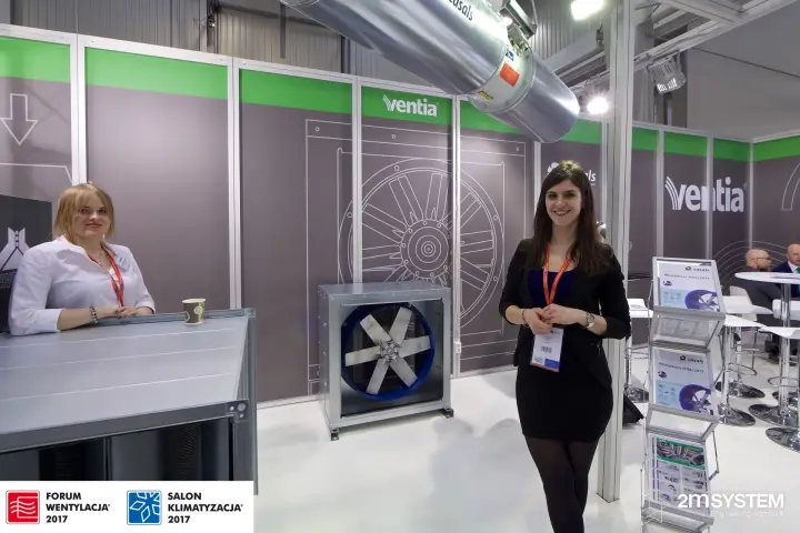 Ventia staff beside an axial box fan and suspended Casals duct fan at Forum Wentylacja 2017