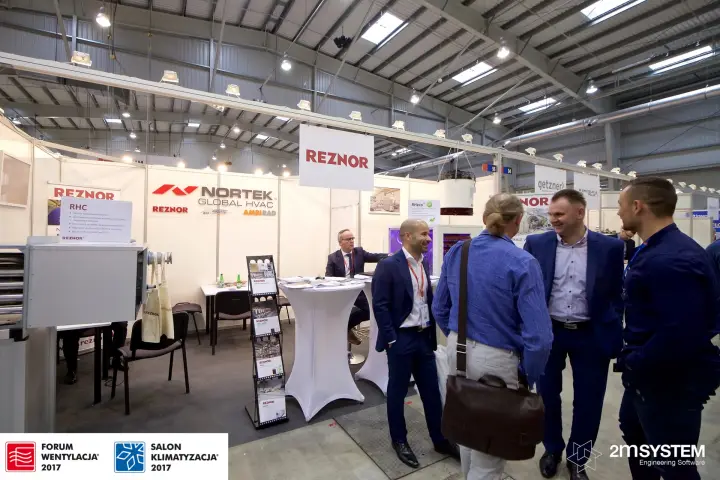 Visitors in front of the Reznor and Nortek Global HVAC stand
