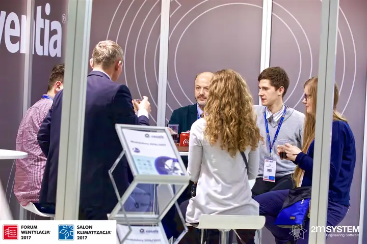 Visitors at a meeting table on the Ventia stand, Casals leaflets at Forum Wentylacja 2017