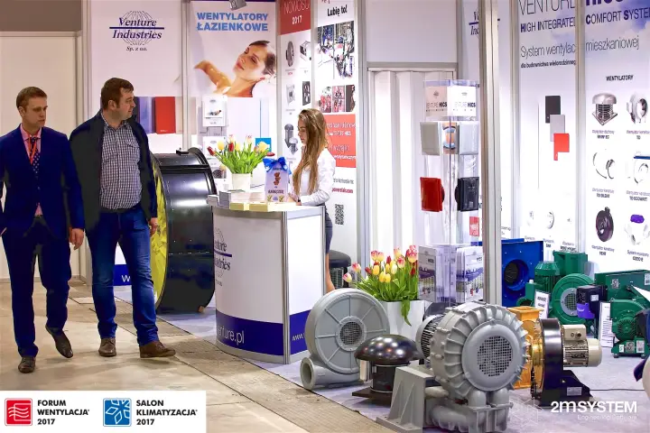 Visitors pass the Venture Industries stand and its blower display at Forum Wentylacja 2017