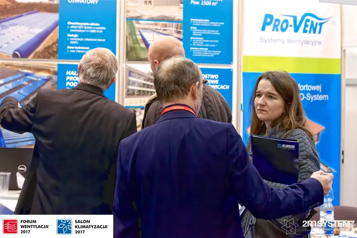 Visitors studying GEO-System project boards at the Pro-Vent stand at Forum Wentylacja 2017