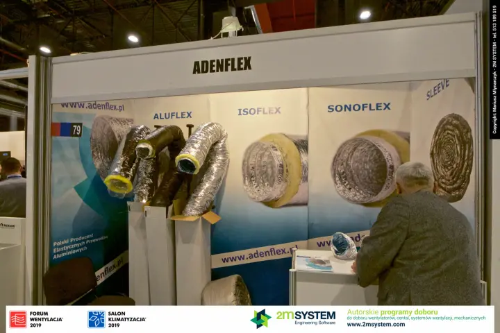 Adenflex booth with insulated flexible ducts and product range graphics