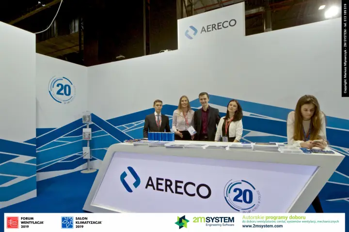 Aereco reception with team behind the anniversary counter at Forum Wentylacja 2019