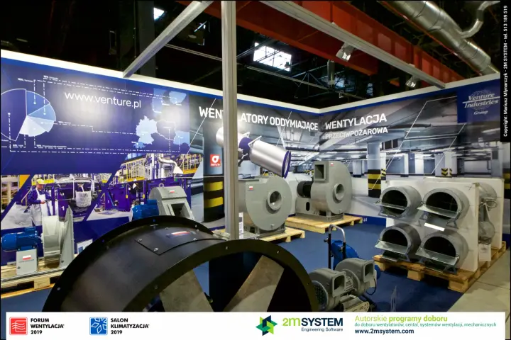 Black axial fan in front of Venture Industries smoke ventilation display at Forum Wentylacja 2019