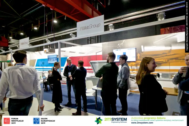 Crowded aisle front of the Fläkt Group stand with suspended unit at Forum Wentylacja 2019