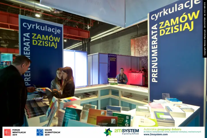 Cyrkulacje bookstall with technical books and subscription banners