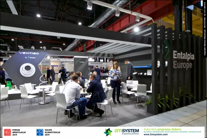 Entalpia Europe stand with dark slatted wall and seating area at Forum Wentylacja 2019