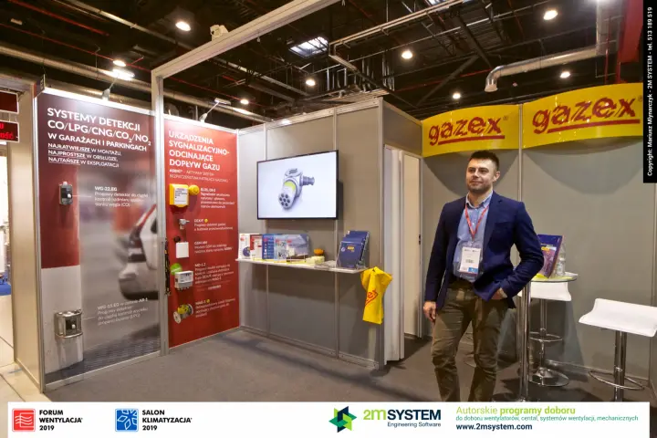 Gazex stand with CO/LPG gas detection panels and yellow curved fascia at Forum Wentylacja 2019