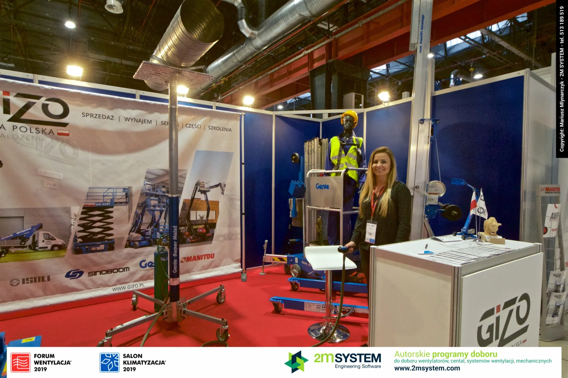 Gizo stand with Genie material lifts and a mannequin in safety gear at Forum Wentylacja 2019
