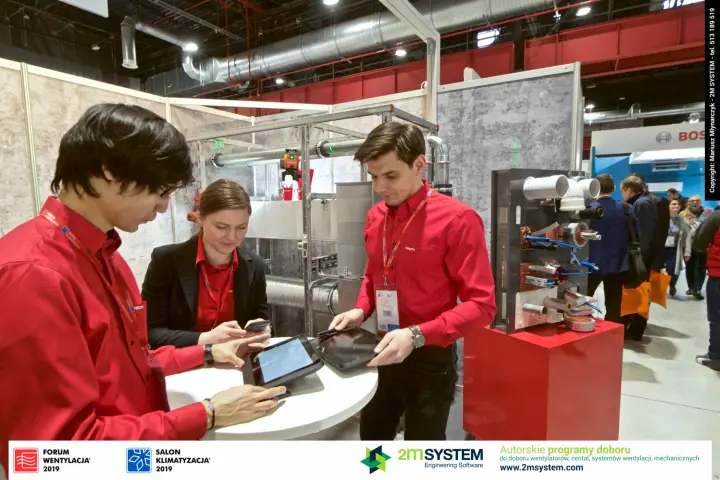 Hilti team with tablets beside the firestop display at Forum Wentylacja 2019