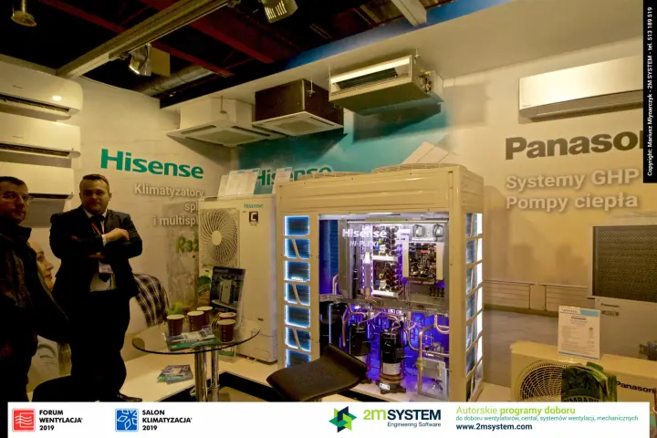 Illuminated open Hisense Hi-Flexi VRF unit next to Panasonic GHP systems at Forum Wentylacja 2019