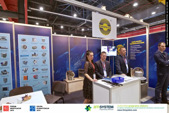 Konwektor team on stand with fan samples and product poster at Forum Wentylacja 2019