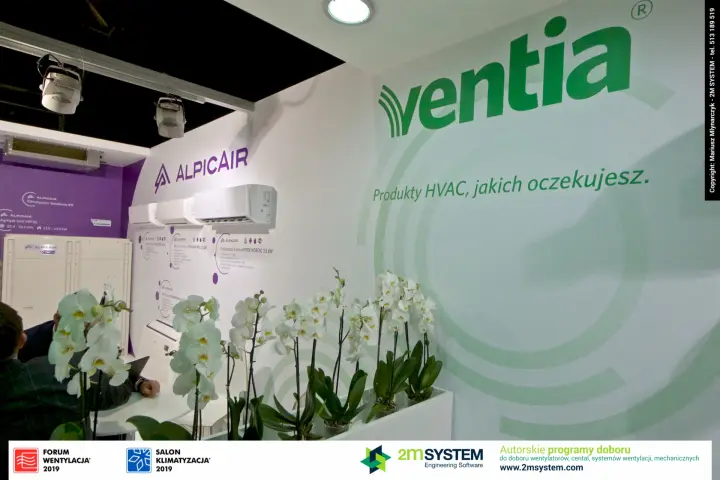 Large Ventia logo above orchids with Alpicair split units behind