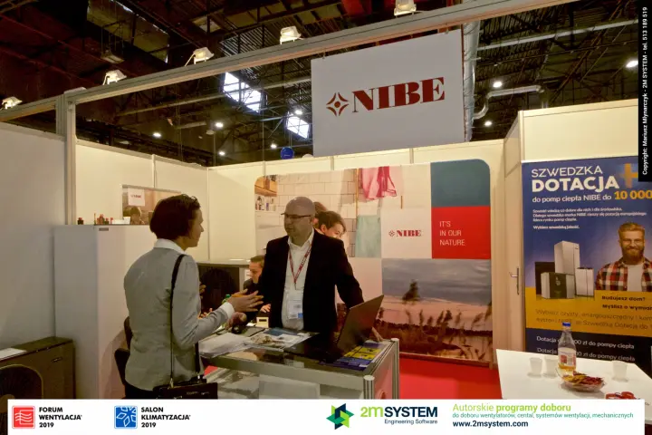 NIBE counter with "It's in our nature" graphic and subsidy poster at Forum Wentylacja 2019