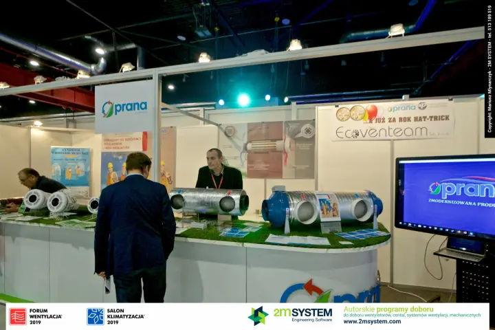 Prana decentralised recuperators displayed on an artificial-grass counter at Forum Wentylacja 2019