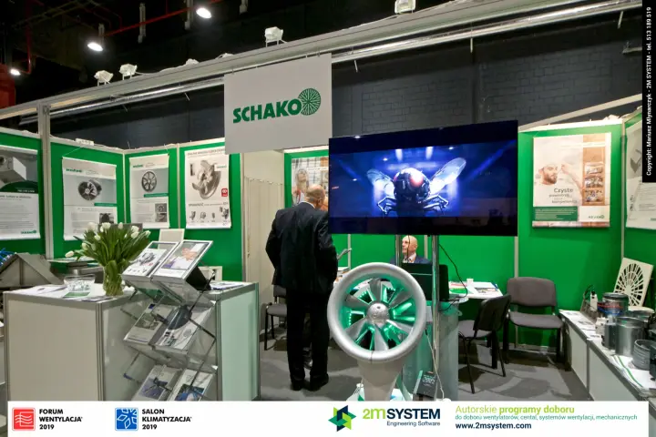 Schako stand with green-lit axial fan and fan efficiency posters at Forum Wentylacja 2019