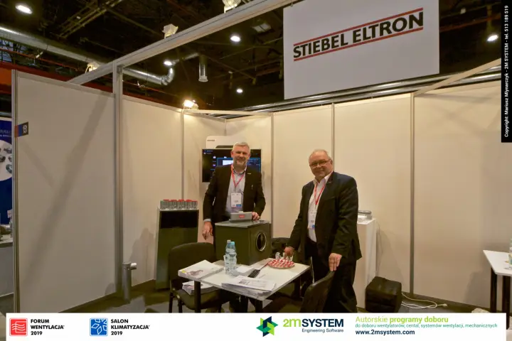 Stiebel Eltron team at stand 151 beside an insulated duct box at Forum Wentylacja 2019