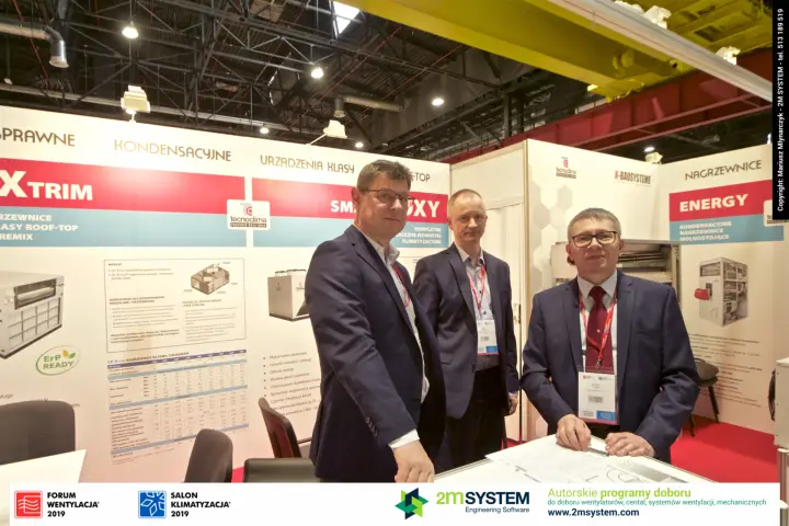 Tecnoclima staff with CF-Xtrim, smartBOX and Energy panels behind