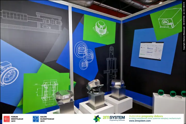 Three galvanised roof fans before blue and green technical graphics at Forum Wentylacja 2019
