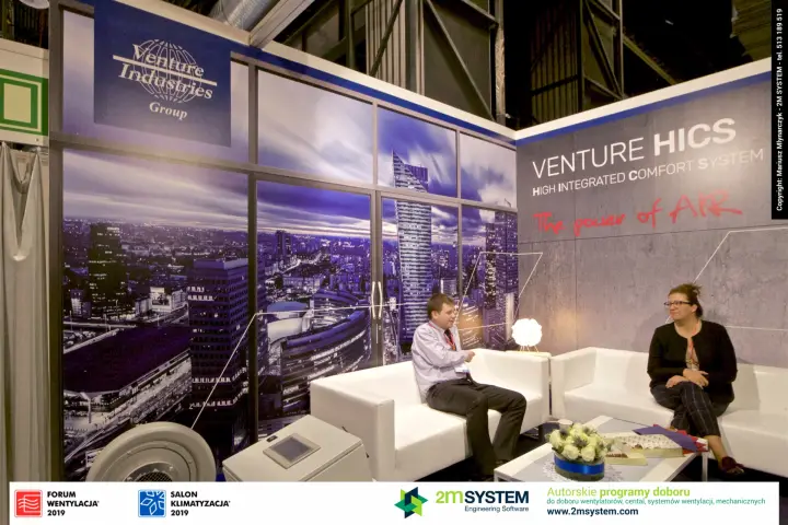 Venture Industries Group logo over the skyline wall and HICS lounge