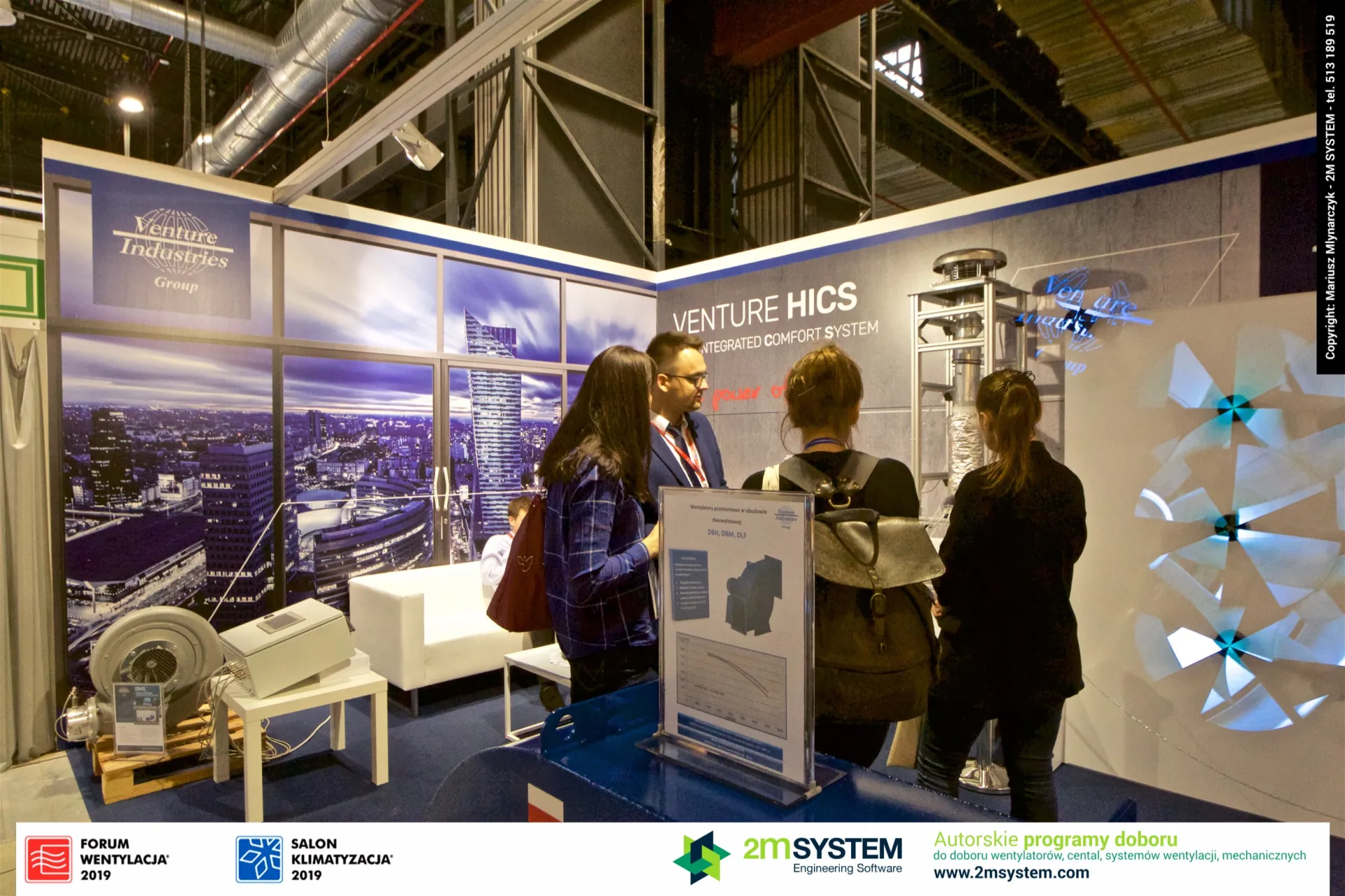 Visitors at the Venture HICS area with fan data sheet display at Forum Wentylacja 2019