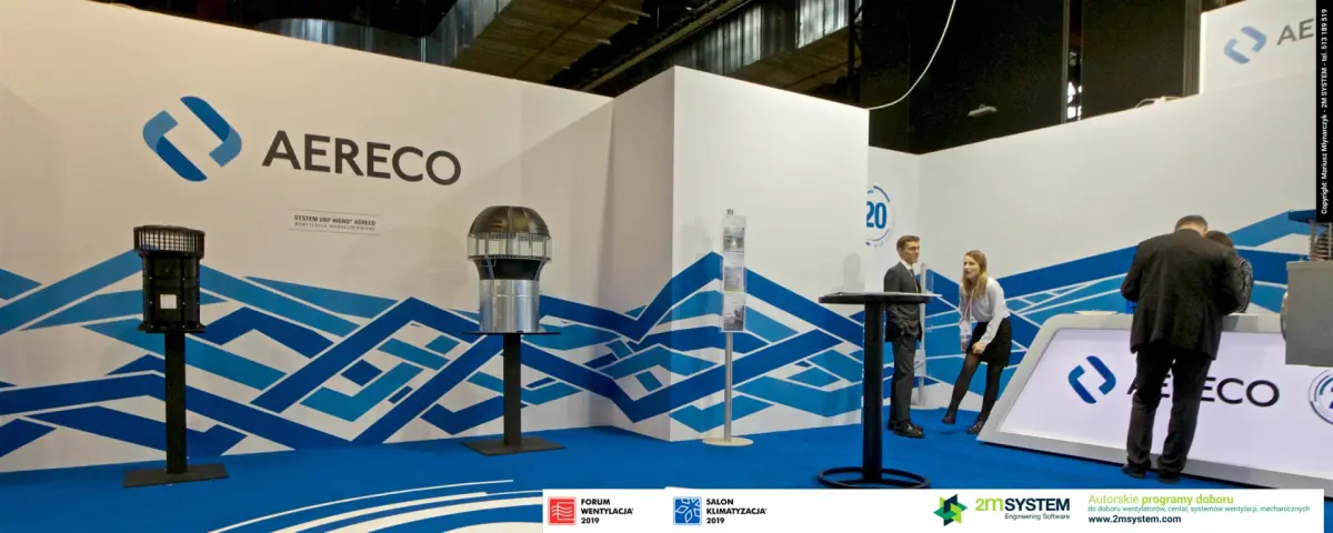 Wide view of Aereco roof extractors and the lit reception desk at Forum Wentylacja 2019