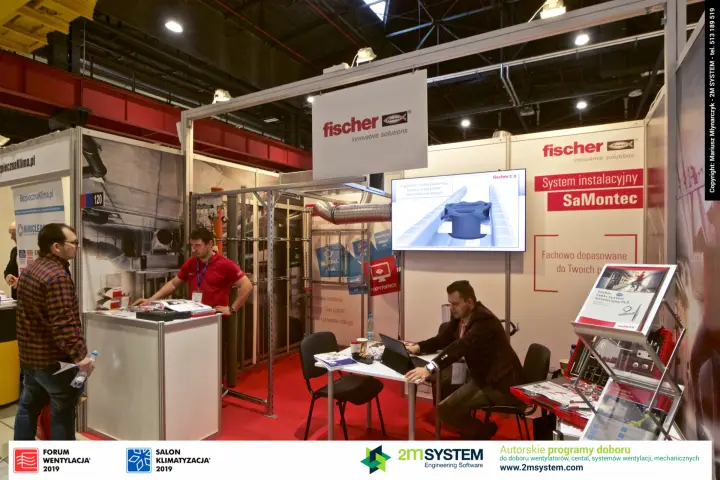 Wide view of Fischer stand 120 with duct support frame display at Forum Wentylacja 2019