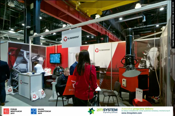 Wide view of the Klimawent stand with extraction units and counter