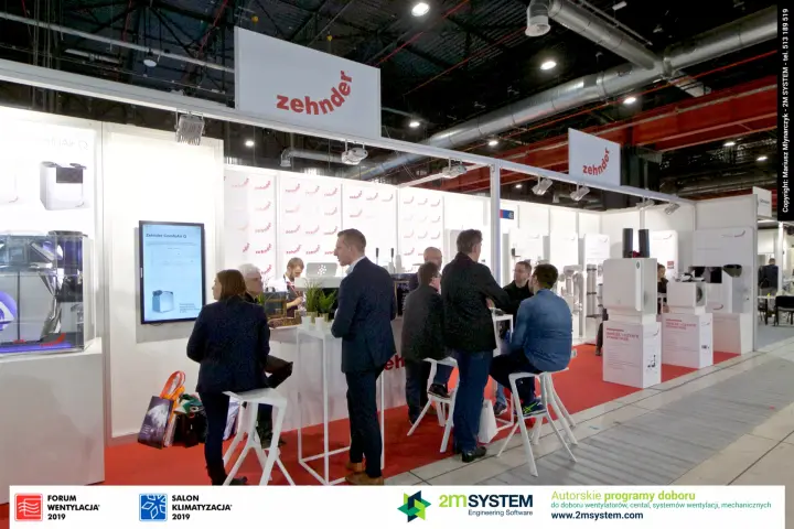 Zehnder stand with ComfoAir Q display and busy coffee bar at Forum Wentylacja 2019