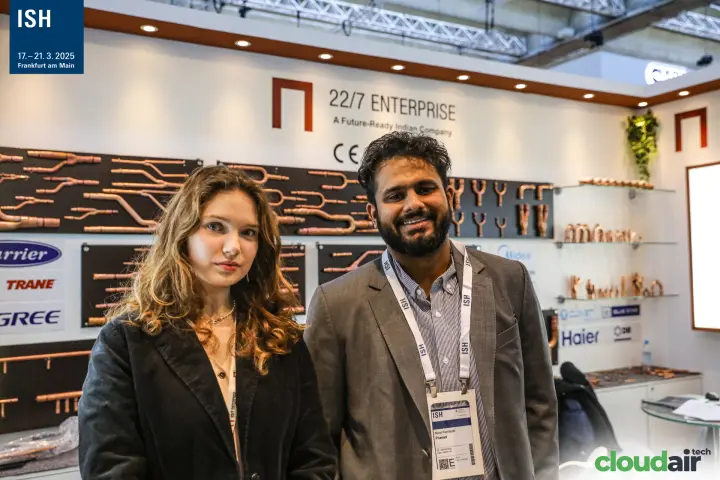 22/7 Enterprise stand team with copper fittings on display walls