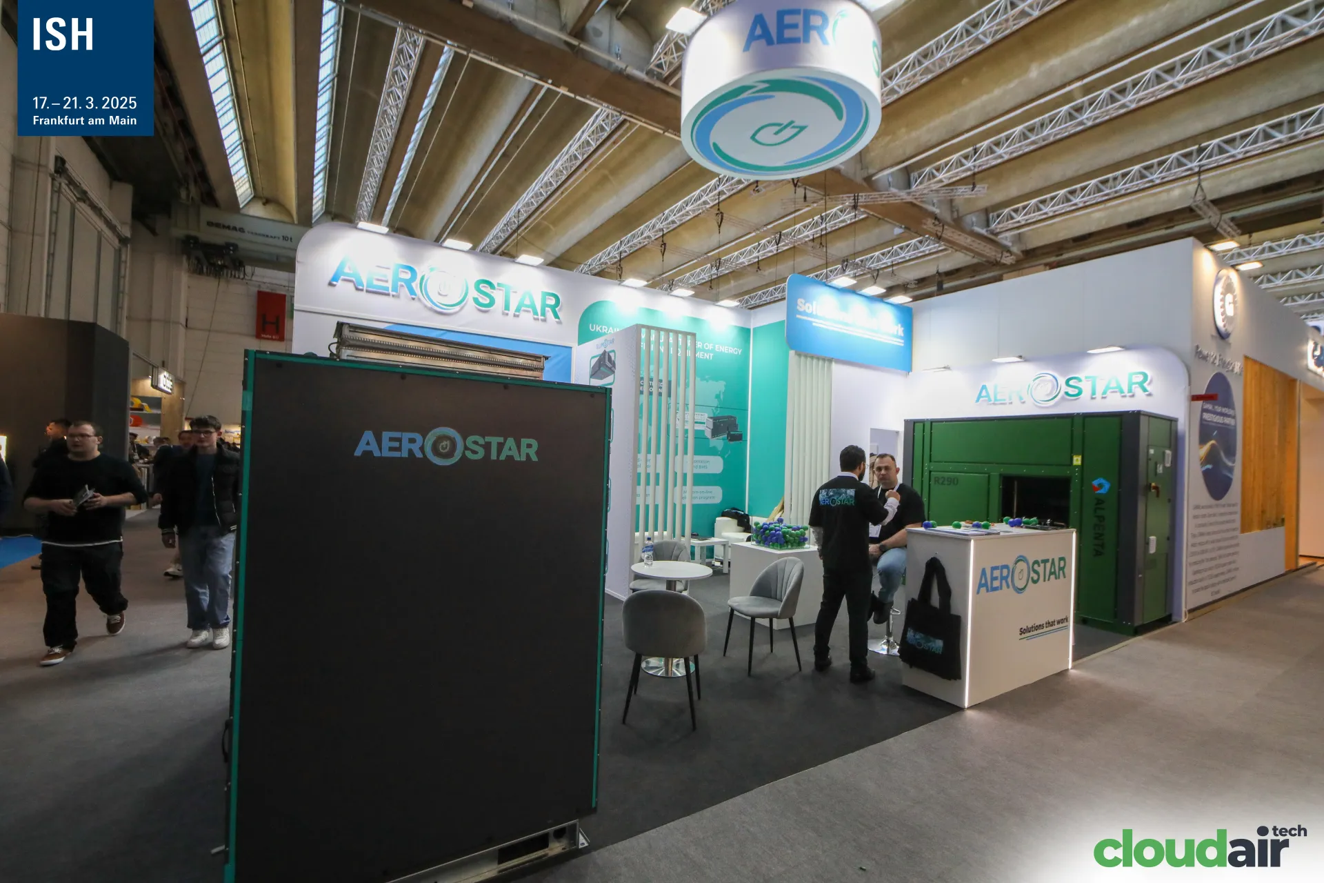 Aerostar stand with black AHU at the aisle and hanging logo drum at ISH 2025