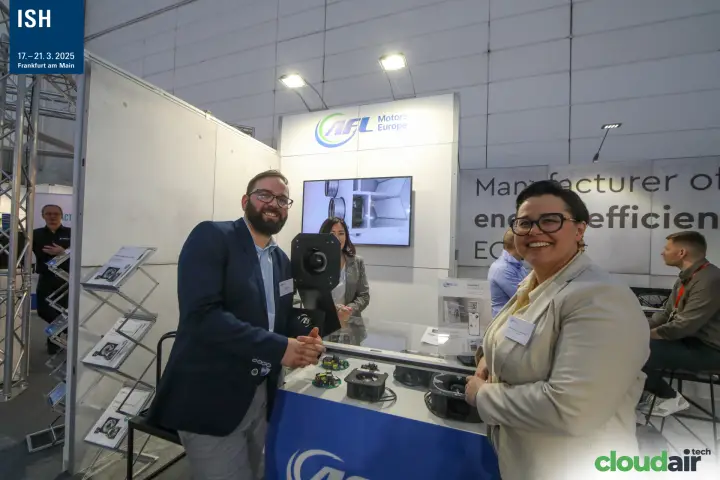 AFL Motors Europe staff beside EC fans and electronics display at ISH 2025