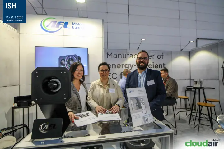 AFL Motors Europe team with catalogues and a mounted EC fan at ISH 2025
