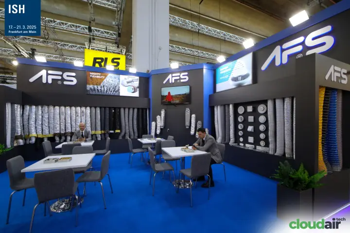 AFS flexible duct walls and round diffuser display around meeting tables at ISH 2025
