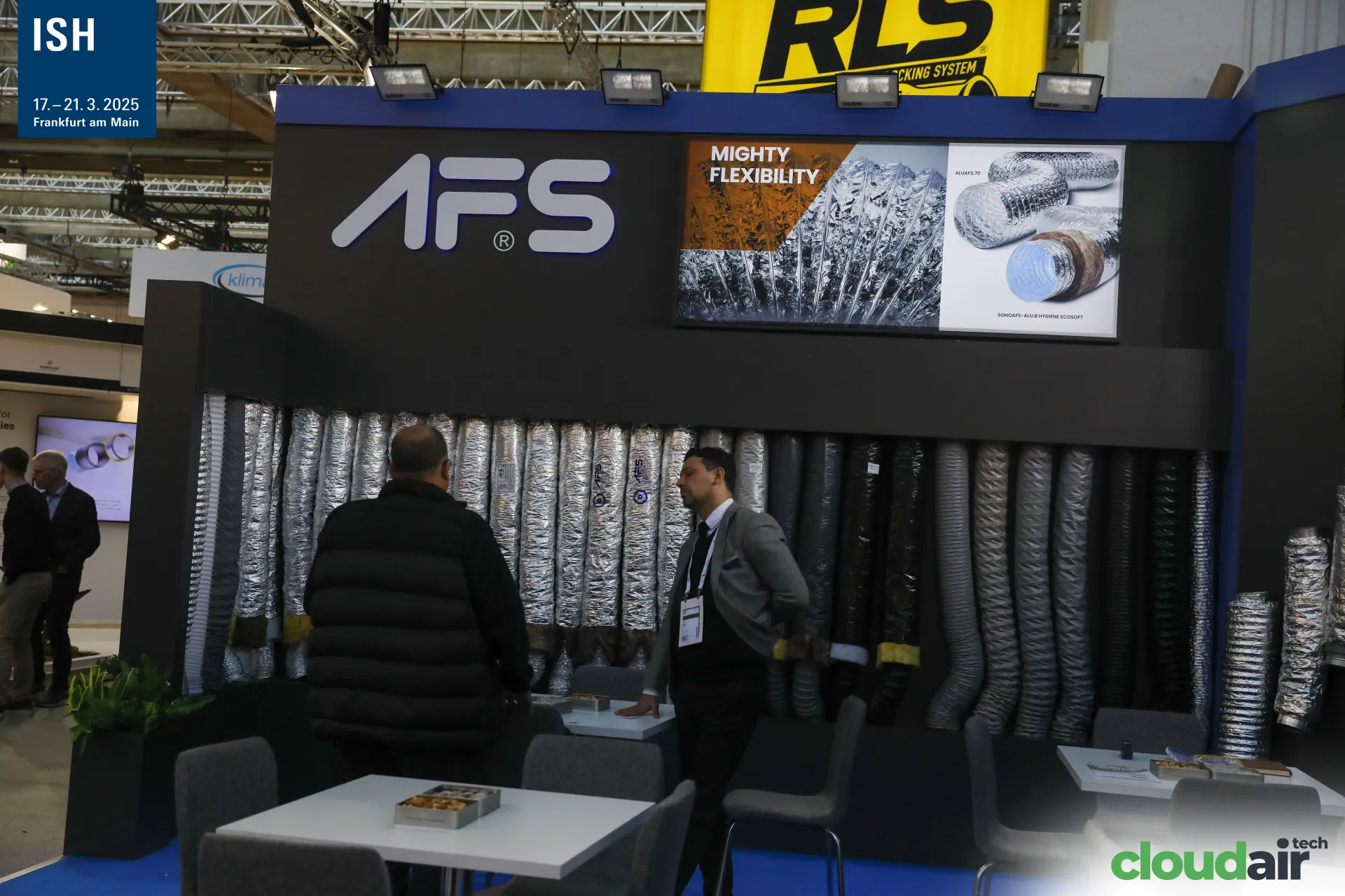 AFS stand wall of insulated flexible ducts under Mighty Flexibility lightbox at ISH 2025