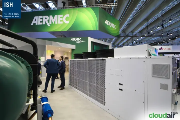 Air-cooled Aermec unit with top-mounted fans under the green banner at ISH 2025
