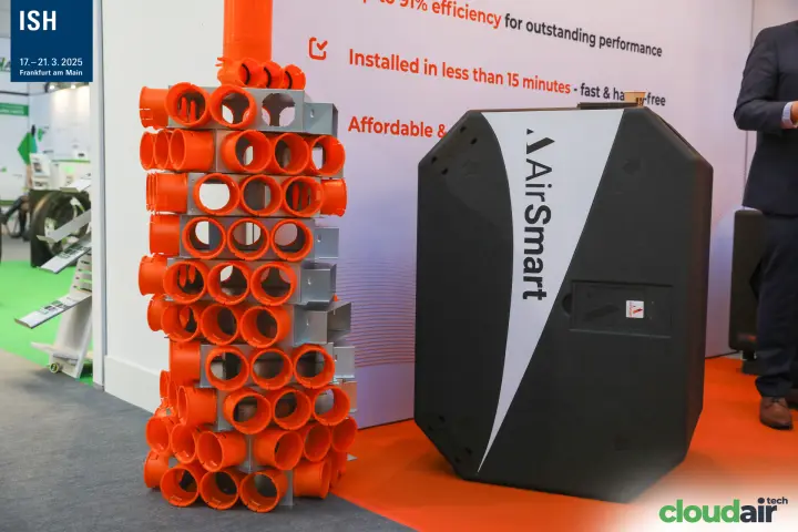 AirSmart ventilation unit beside a tower of orange duct distribution boxes