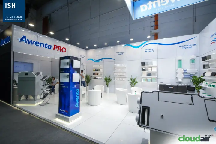 Awenta stand overview with white armchairs and product walls