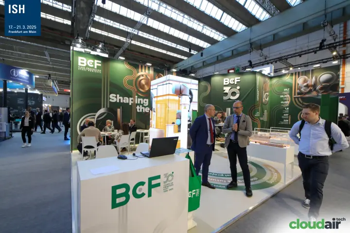 BcF stand marking 30 years with copper pipe displays and robot cell at ISH 2025