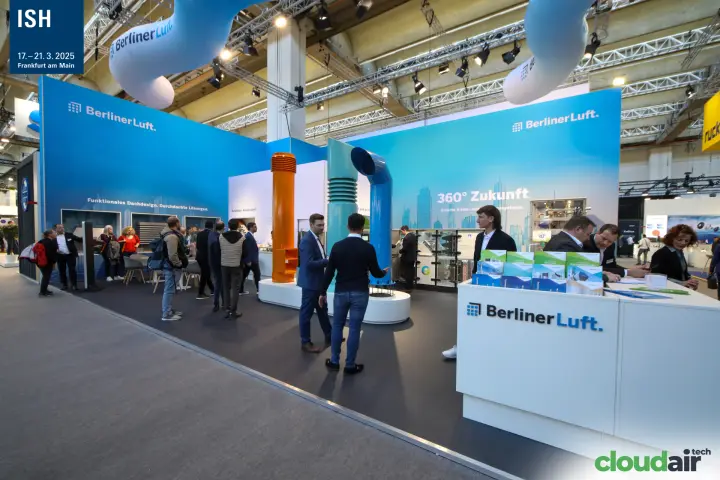 BerlinerLuft stand with orange, teal and blue roof outlets and brochure counter at ISH 2025