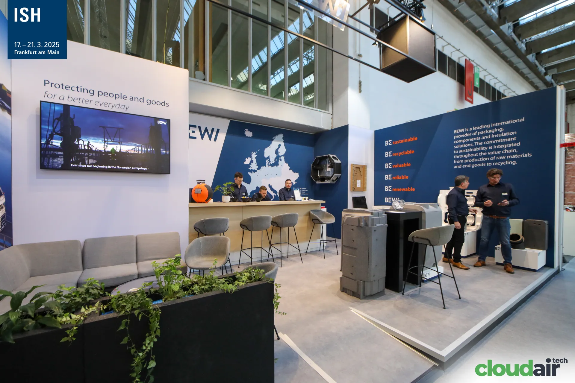 BEWI stand with insulation components and "Protecting people and goods" wall at ISH 2025