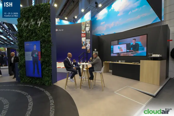 Brink meeting area beside a green wall with the slogan "Air for life" at ISH 2025