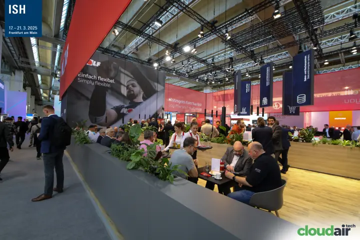 Busy café area on the Wolf stand behind a planted counter at ISH 2025