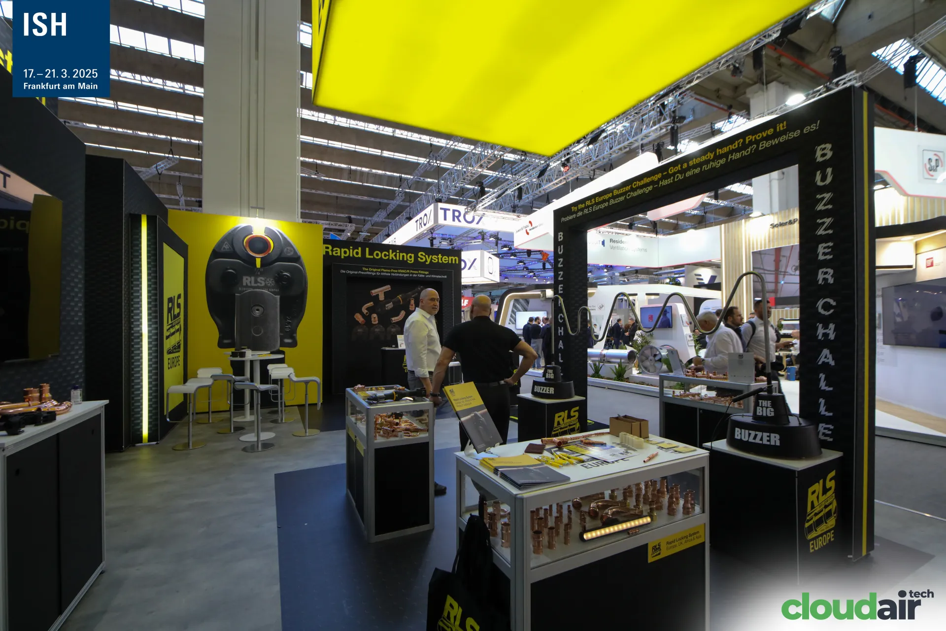Buzzer game and fitting showcases inside the RLS Europe stand at ISH 2025