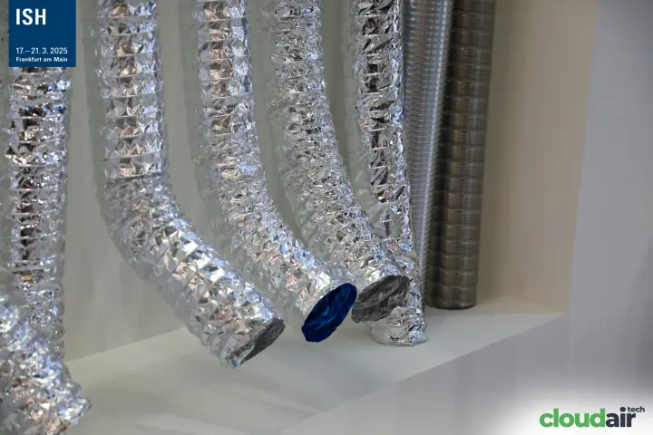 Close-up of aluminium flexible ducts on a white shelf